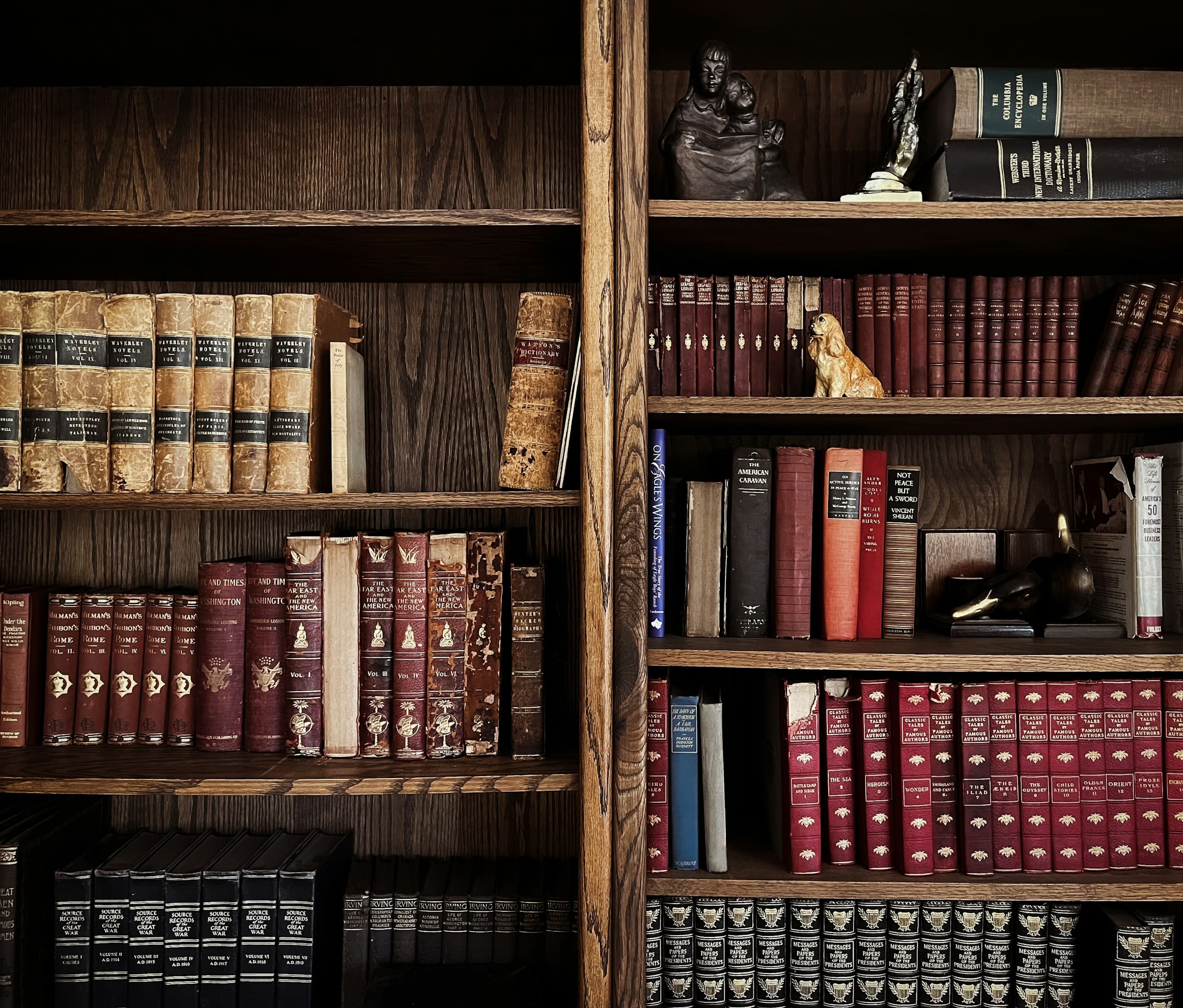 Shelves of bound legal volumes in a wood-panelled library